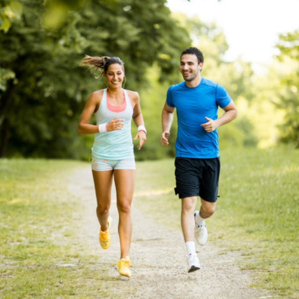 5 benefits of exercise couple running down trail